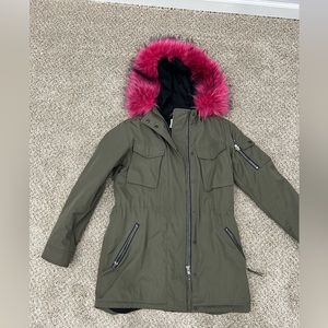 Green jacket with pink fur hood
